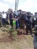 UON- VC watering the tree he planted